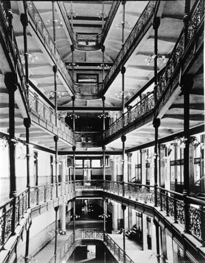 An interior view of City Hall showing the iron grillwork of the atrium.