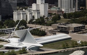 Photograph featuring an aerial view of the Milwaukee Art Museum with its famous wings open. 