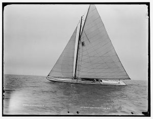 Photograph featuring a yacht sailing in Milwaukee, 1901. 