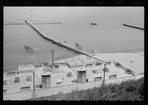 Photograph featuring a recreational beach area in Milwaukee in July, 1940.