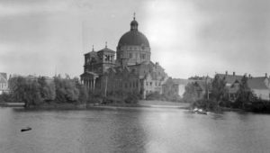 Photograph of the Basilica of St. Josaphat over the lagoon in Kosciuszko Park. 