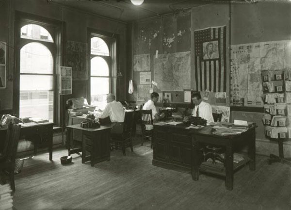 Photograph of the editorial office for the first Polish-language newspaper published in Milwaukee, Kuryer Polski, taken in 1928. 