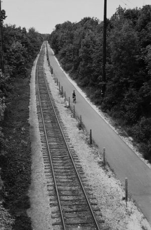 A bicyclist rides along the Oak Leaf trail on the east side near Locust Street in 1981.