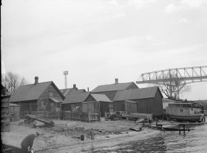 This 1936 photograph shows a group of fishing shacks that were once the heart of the Jones Island residential community. 