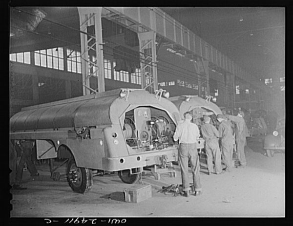 1943 photograph of Heil Company war production employees making gasoline tanker trucks.