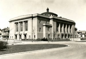 Photograph of the exterior of the former Third Church of Christ, Scientist. Located across the street from Sherman Park, this church was purchased in 1980 and housed the Schrager Auction Gallery until 2010.