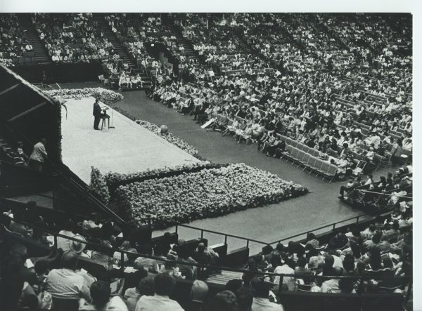 A large audience listens to a speaker at the 1978 National Jehovah's Witnesses Convention, held in the MECCA Arena, now know as the Milwaukee Arena.