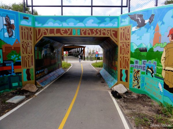 This colorful mural on Pierce Street marks an entry point to the Hank Aaron Trail. 